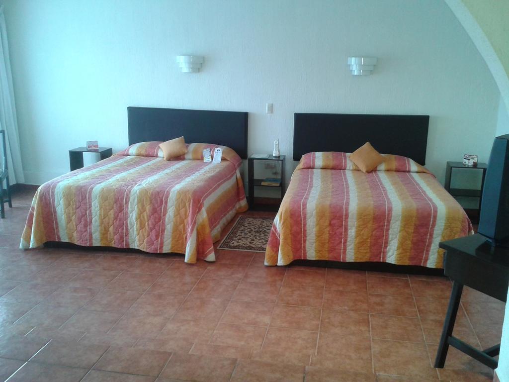 Hotel ฟอร์ติน เด ลาส ฟลอเรส ห้อง รูปภาพ