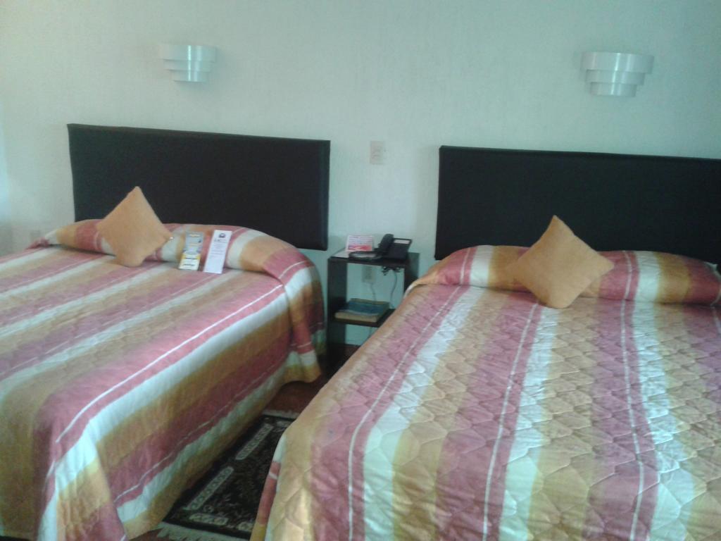 Hotel ฟอร์ติน เด ลาส ฟลอเรส ห้อง รูปภาพ